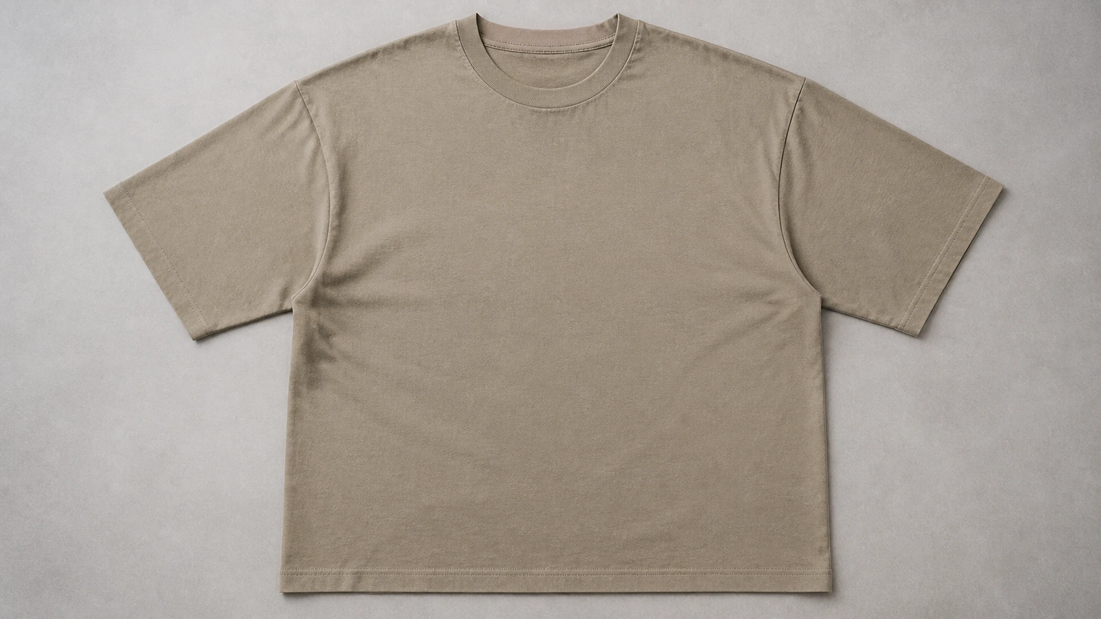 How to Choose Fabric Weight for Custom T-Shirts Oversized unbranded T-shirt laid flat with a structured silhouette