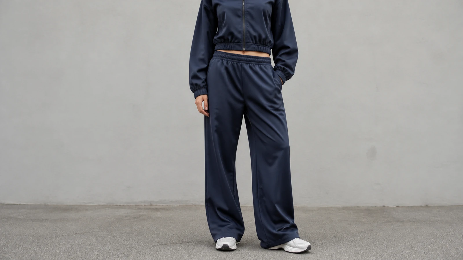 Are Tracksuits Still In? Wide leg track pants with a shorter modern track jacket