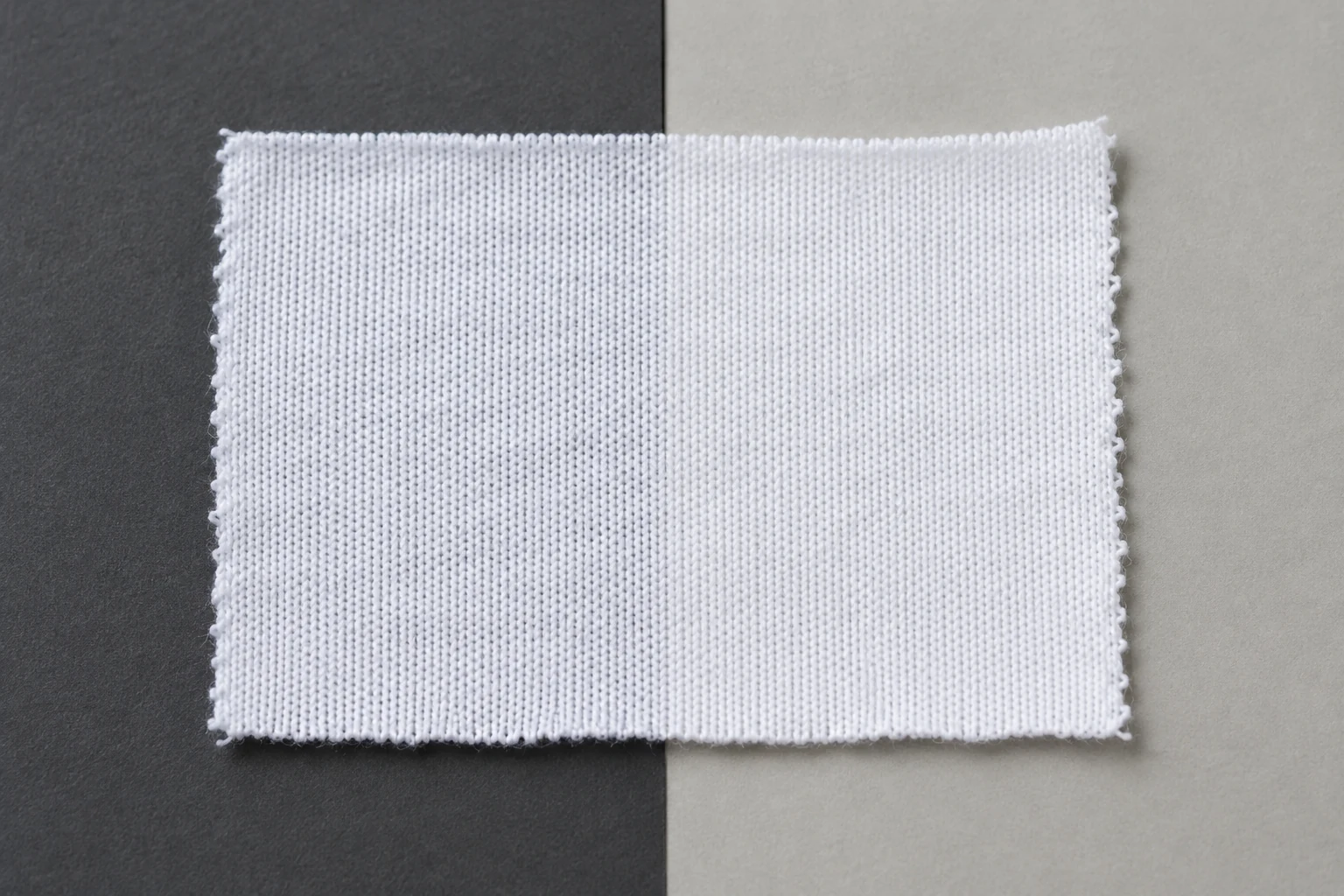 How to Assess Show-Through in White Custom T-Shirts White knit swatch laid across dark and light backing panels.